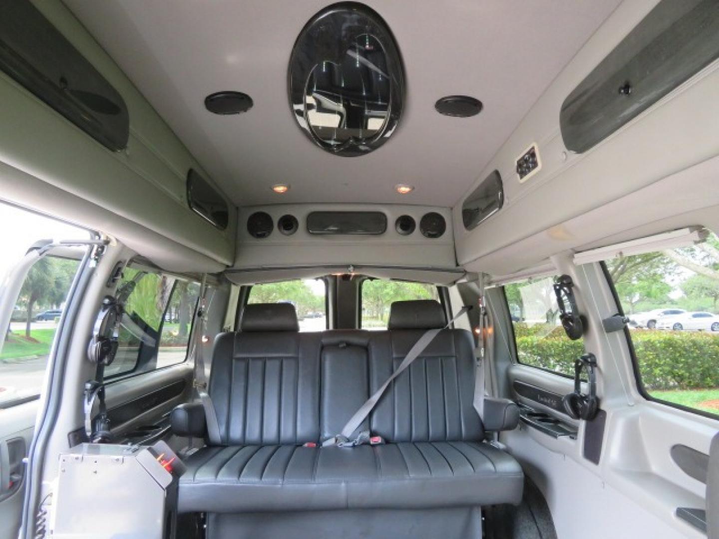 2010 White /Gray Chevrolet Express (1GNUGCD48A1) , located at 4301 Oak Circle #19, Boca Raton, FL, 33431, (954) 561-2499, 26.388861, -80.084038 - You are looking at a Gorgeous 2010 Chevy Express Handicap Wheelchair Conversion Van Explorer Limited SE with 31K Original Miles, Braun Century 750lb Side Entry Wheelchair lift, Tie Down System in the Floor, Rear Entertainment with Flat Screen TV/DVD, Leather Interior, Rear Power Folding Bench Seat/b - Photo#49